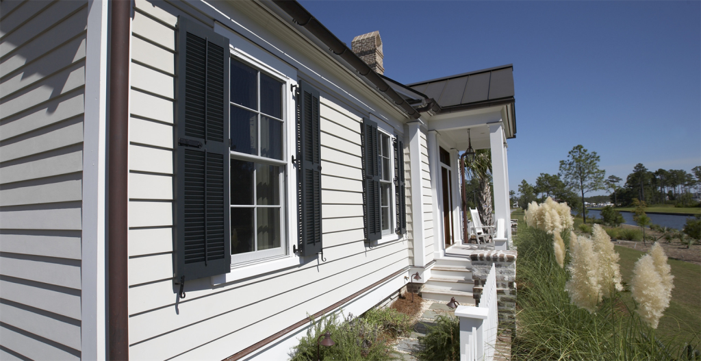 Black and White House with siding