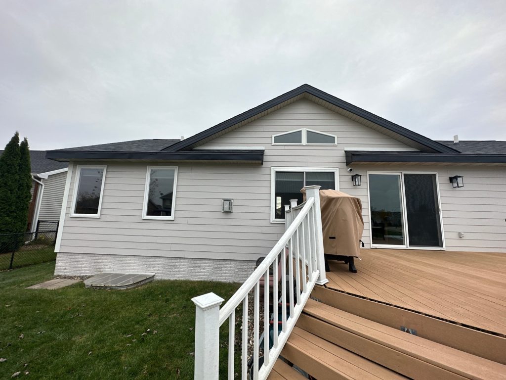 upclose of grey house with James Hardie siding 