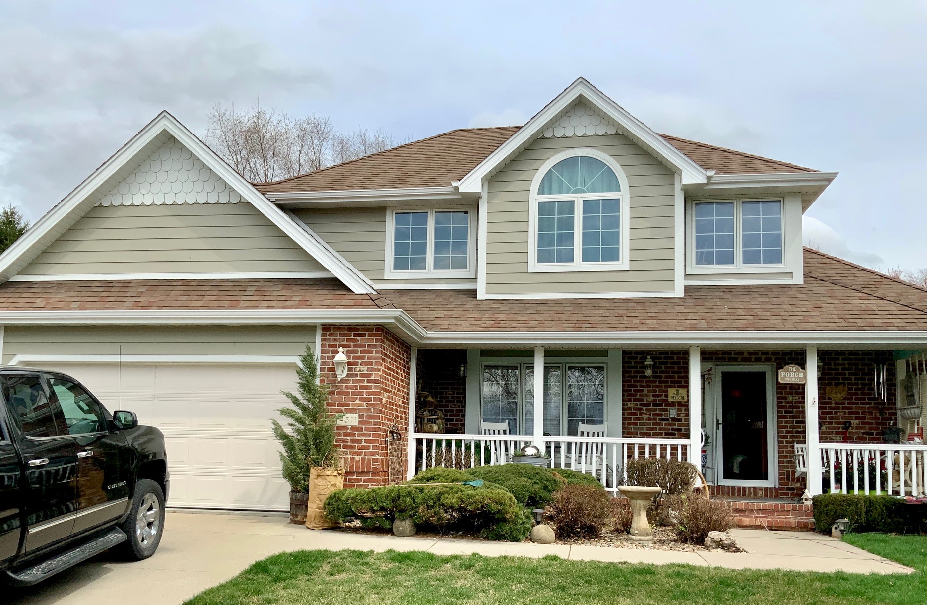 Green house with James Hardie siding