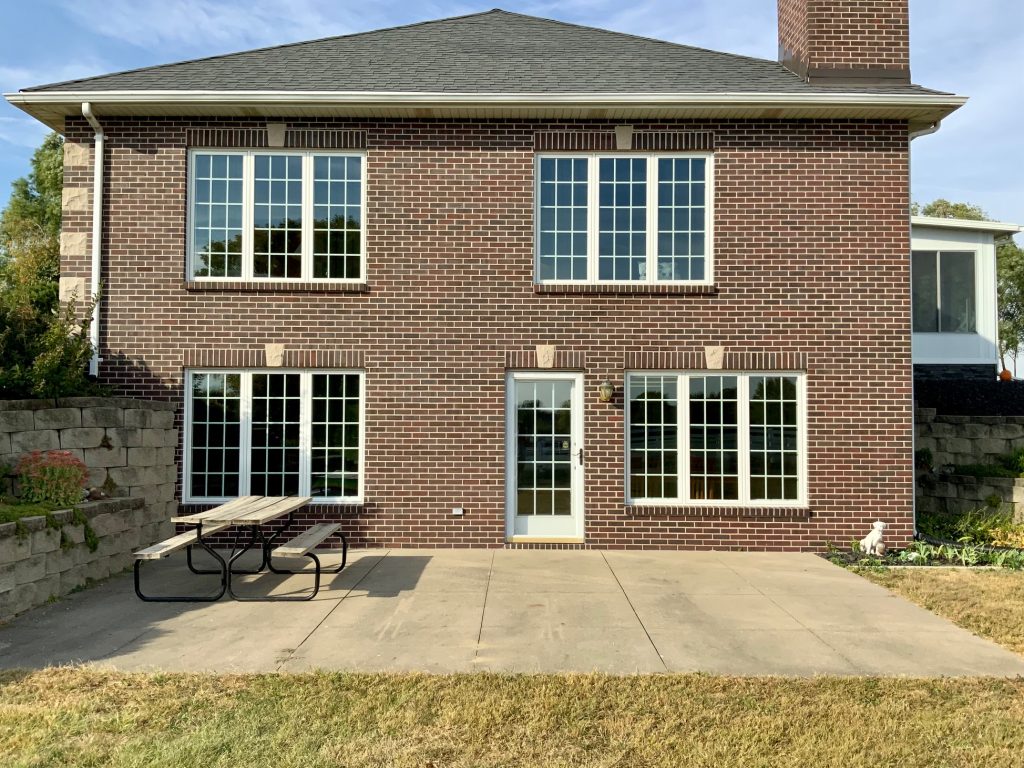 Briown brick house with new windows