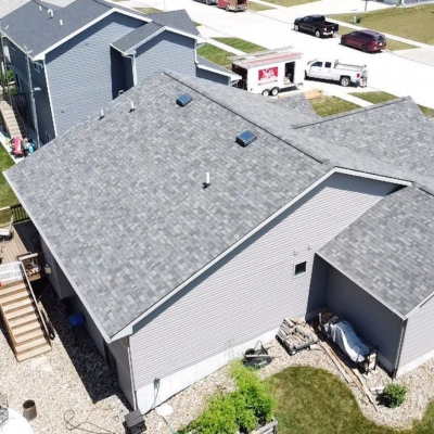 Roof with new shingles